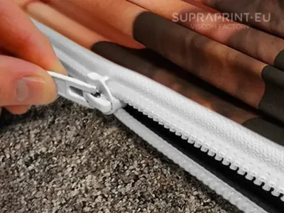 Werbegrafiken mit Reißverschluss